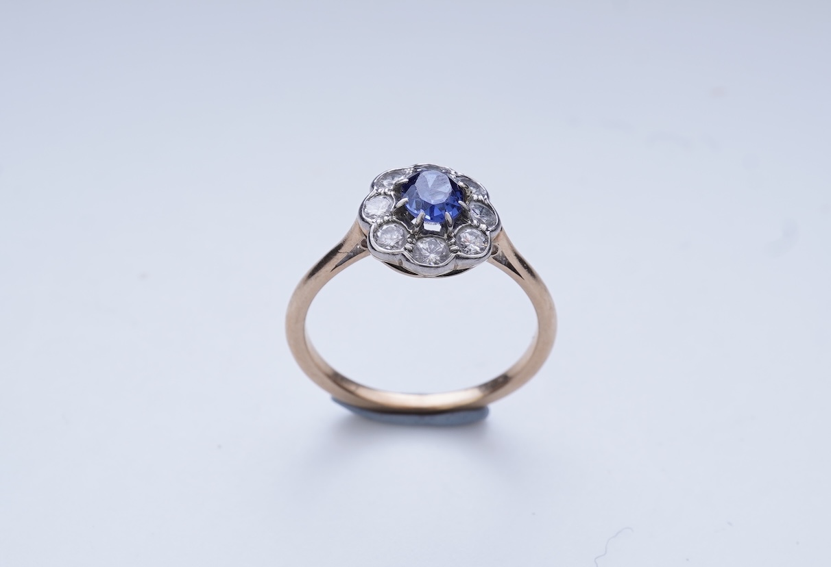 A synthetic sapphire and diamond ring
